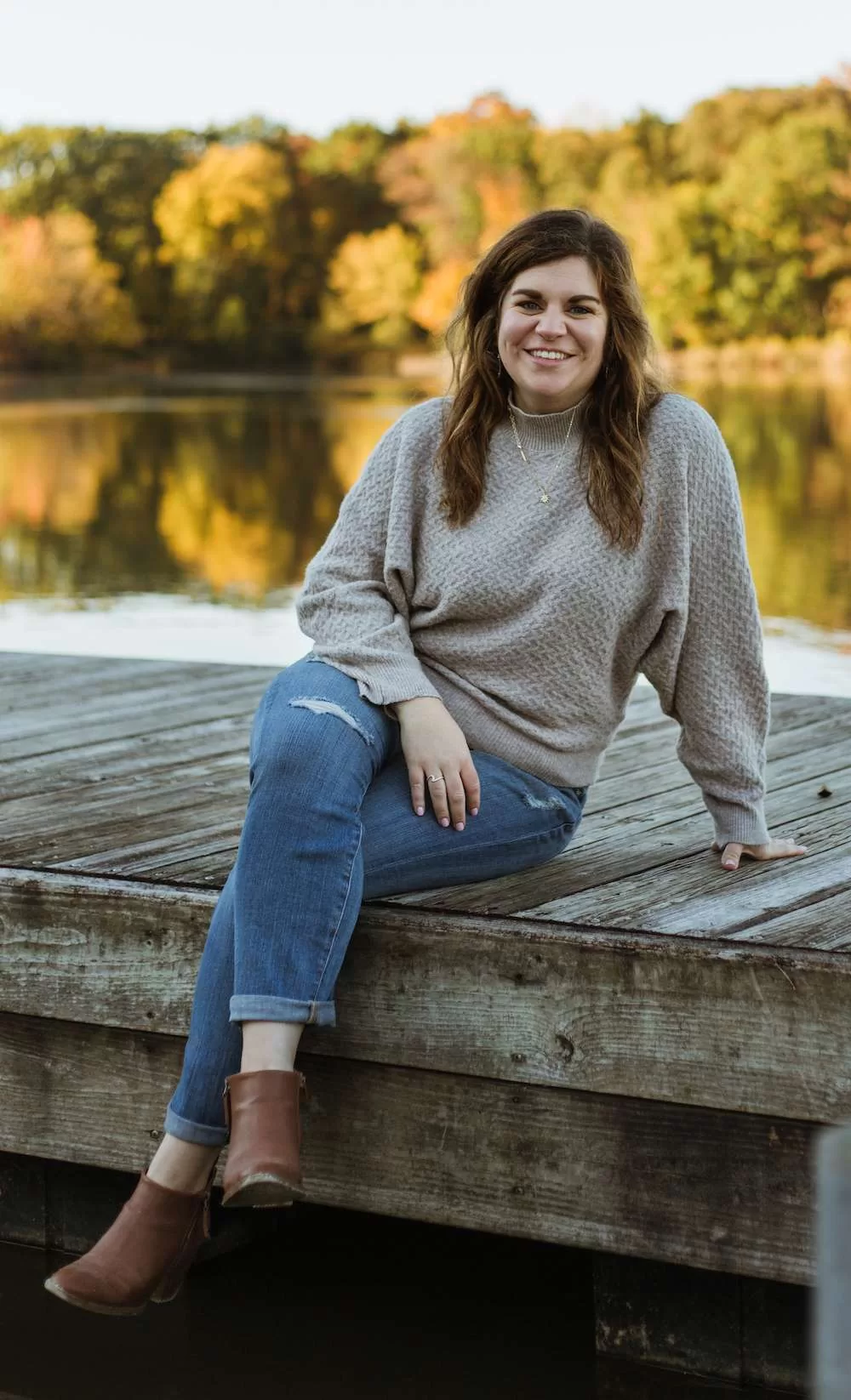 BINGE Dietitian - Meghan Monte posing on a dock.