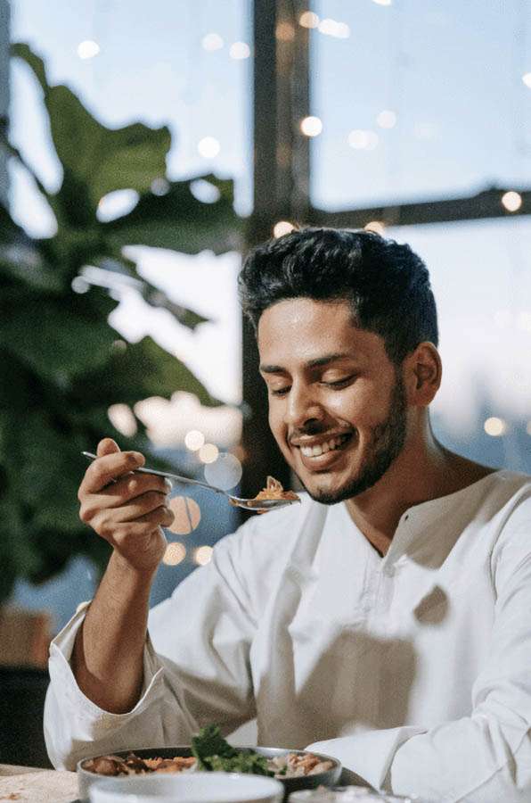 Tune Into Your Body to Improve Your Relationship with Food - Man Eating