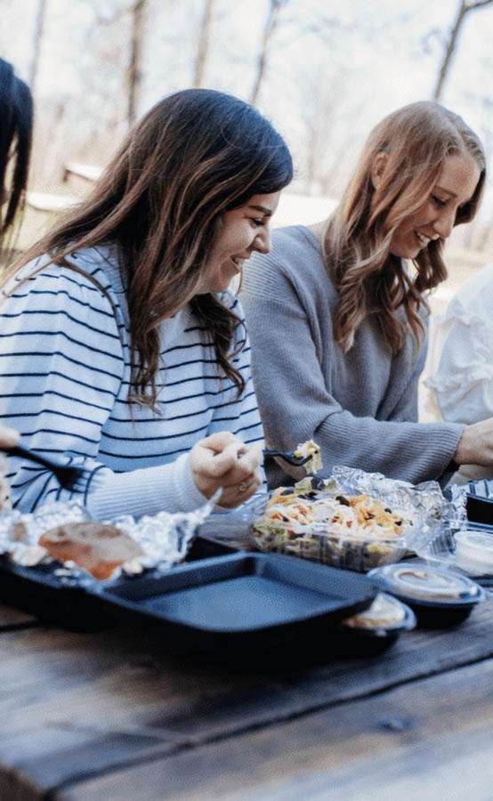 Registered Dietitian Career Benefits - Friends Sharing an Outdoor Meal
