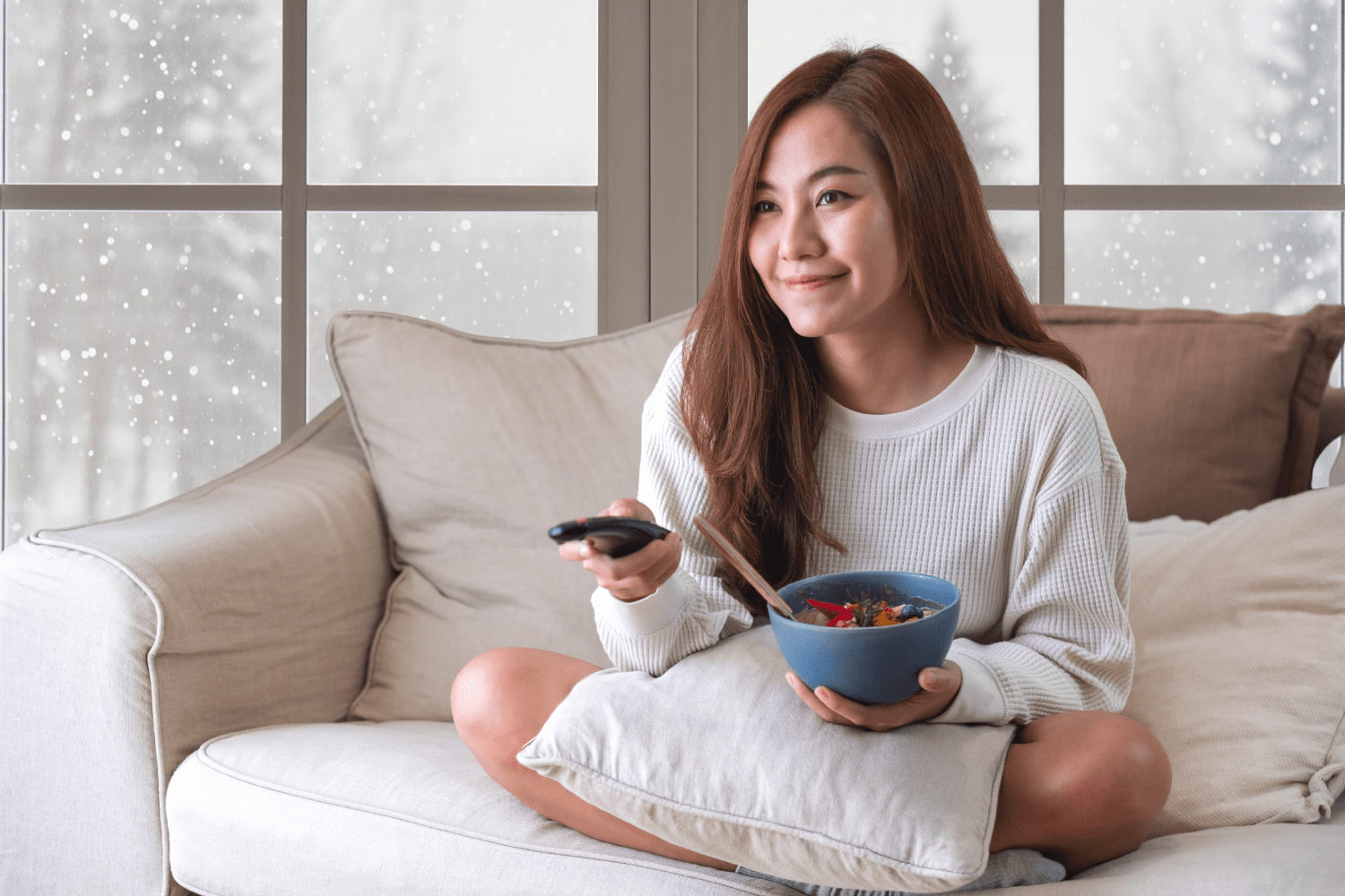 A woman enjoying comfort food without guilt